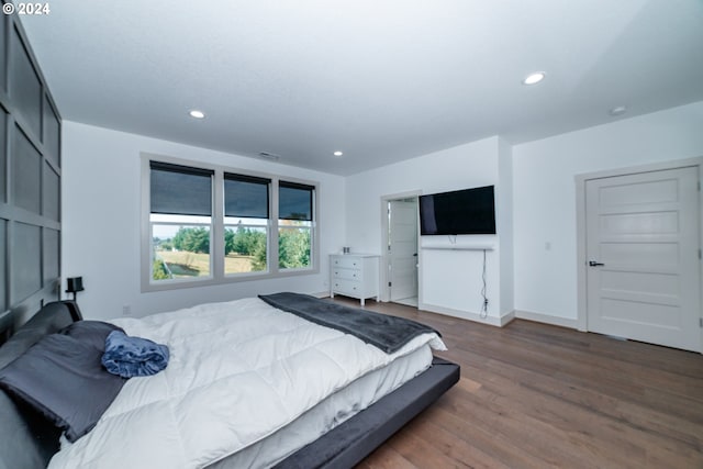 bedroom featuring hardwood / wood-style flooring