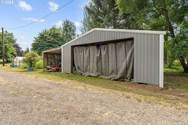 view of outdoor structure featuring a garage