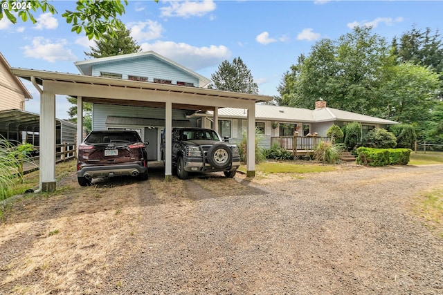 exterior space featuring a carport