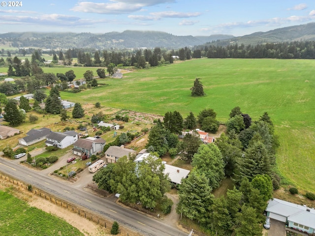 drone / aerial view with a rural view and a mountain view