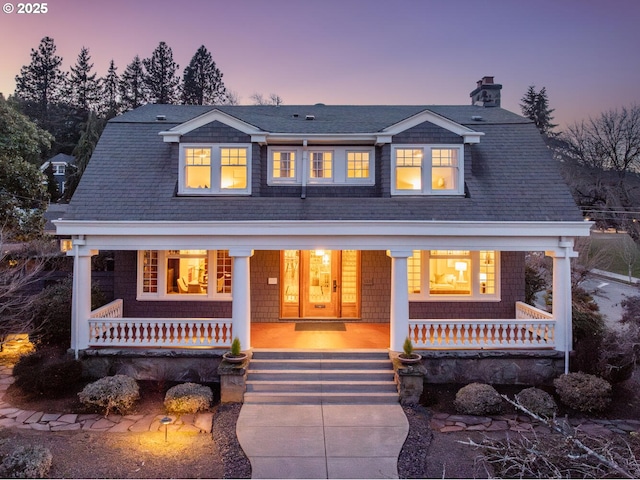 view of front of home featuring covered porch