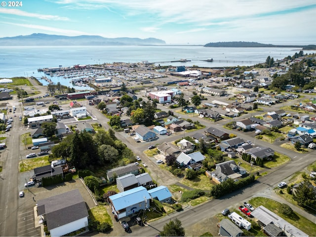 view of property location featuring a water and mountain view