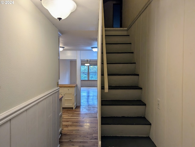 staircase featuring hardwood / wood-style flooring