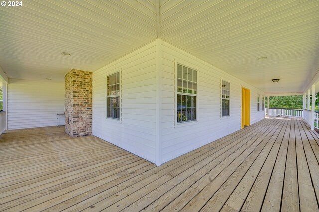 wooden deck featuring a porch