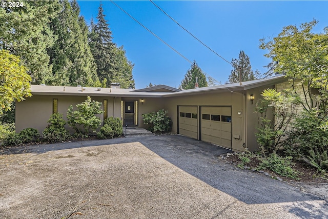 ranch-style house with a garage