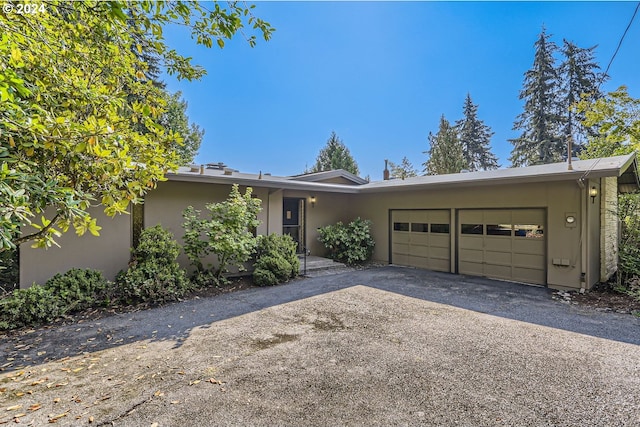 view of front of home featuring a garage