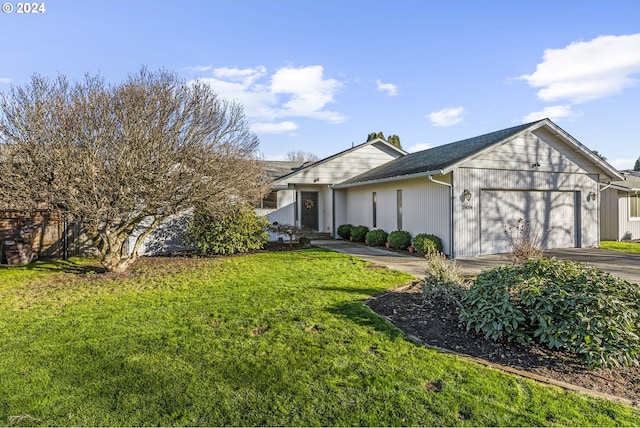 view of home's exterior featuring a yard and a garage