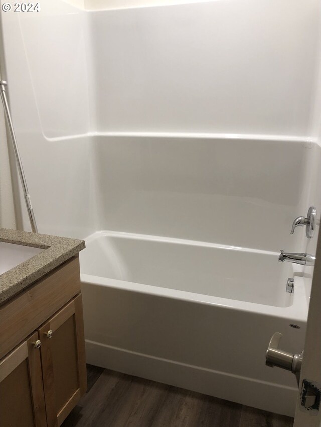 bathroom with wood-type flooring and vanity