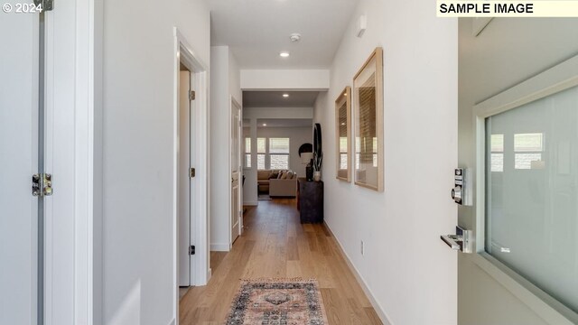 hallway featuring light hardwood / wood-style flooring