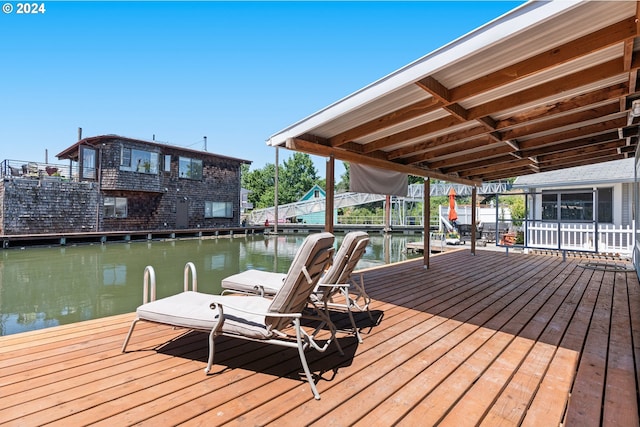 view of dock with a water view