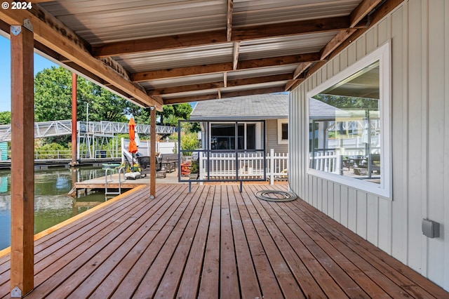 wooden terrace featuring a dock