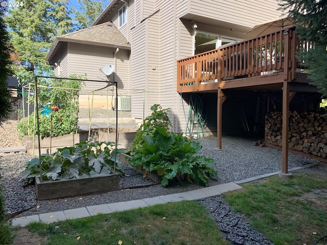 view of home's exterior featuring a deck