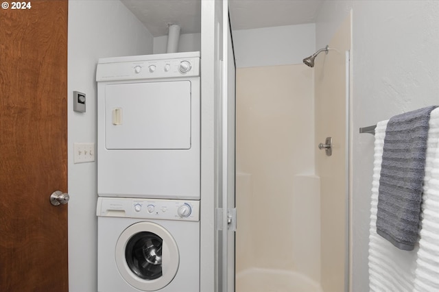 laundry room featuring stacked washer / dryer