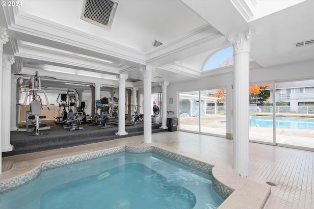 view of swimming pool with decorative columns