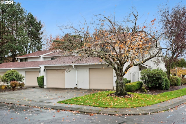 view of side of home with a garage