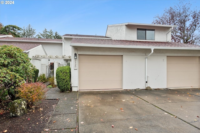 view of front of property featuring a garage