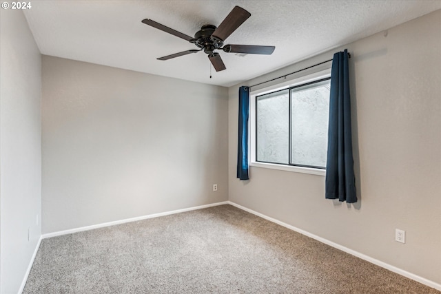 3320 NE 29th St, Gresham, OR 97030 - carpeted empty room with ceiling fan and baseboards
