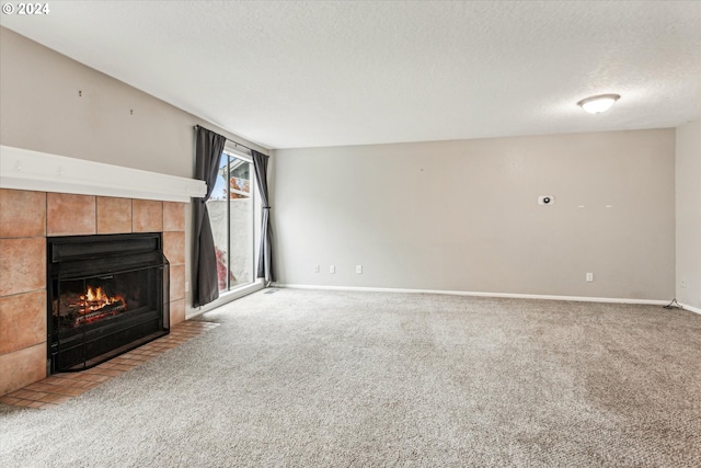 3320 NE 29th St, Gresham, OR 97030 - unfurnished living room with a fireplace, carpet, and a textured ceiling