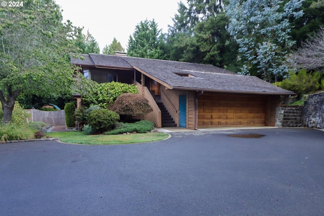 view of front of property featuring a garage