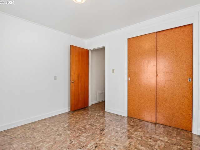 unfurnished bedroom featuring a closet