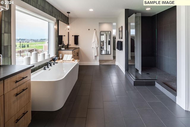 1108 N Helens View Dr, Ridgefield, WA 98642 - full bath featuring baseboards, a freestanding tub, vanity, tile patterned floors, and recessed lighting