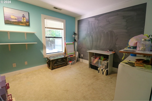 game room featuring light colored carpet