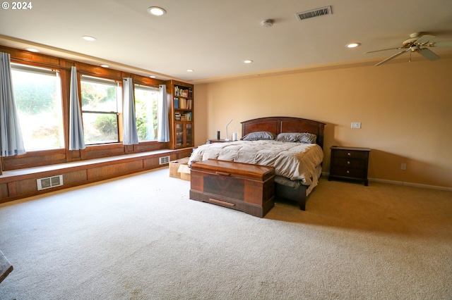 carpeted bedroom featuring ceiling fan