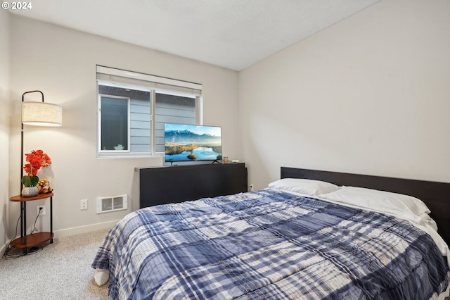 bedroom featuring carpet