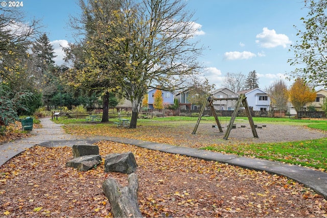 view of property's community with a playground