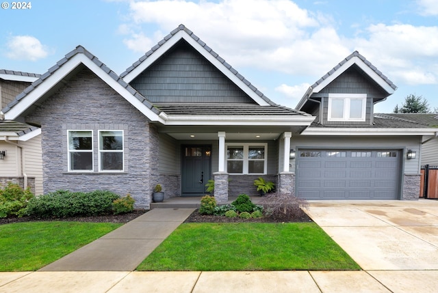 craftsman-style house featuring a garage