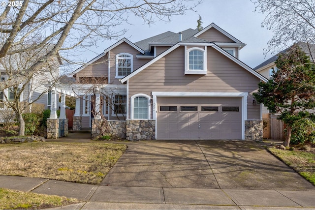 5306 NW Skycrest Pkwy, Portland, OR 97229 - craftsman-style house featuring driveway, a porch, and stone siding