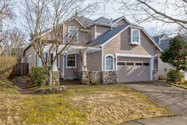 5306 NW Skycrest Pkwy, Portland, OR 97229 - craftsman inspired home featuring a front lawn, driveway, a shingled roof, an attached garage, and fence