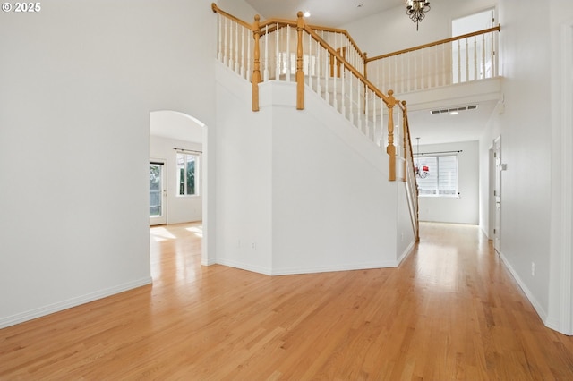 5306 NW Skycrest Pkwy, Portland, OR 97229 - interior space featuring arched walkways, a high ceiling, and a wealth of natural light