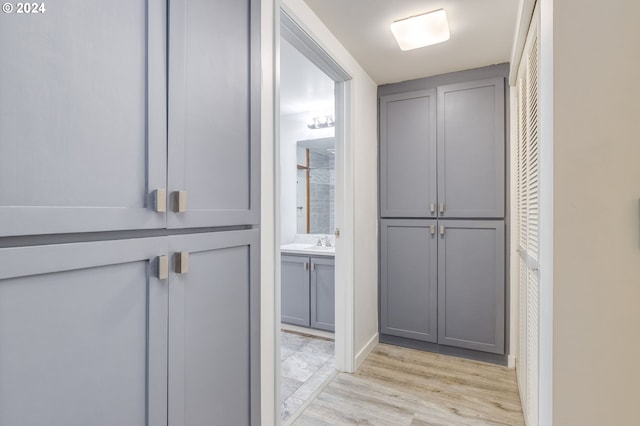 bathroom featuring vanity and hardwood / wood-style flooring