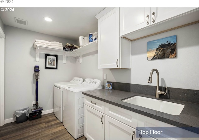 35165 Rueppell Ave, Pacific City, OR 97135 - washroom with independent washer and dryer, cabinet space, dark wood finished floors, recessed lighting, and baseboards