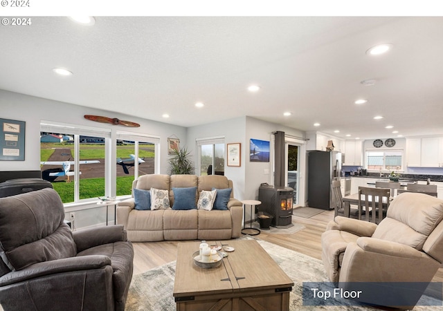 35165 Rueppell Ave, Pacific City, OR 97135 - living area featuring recessed lighting and a wood stove