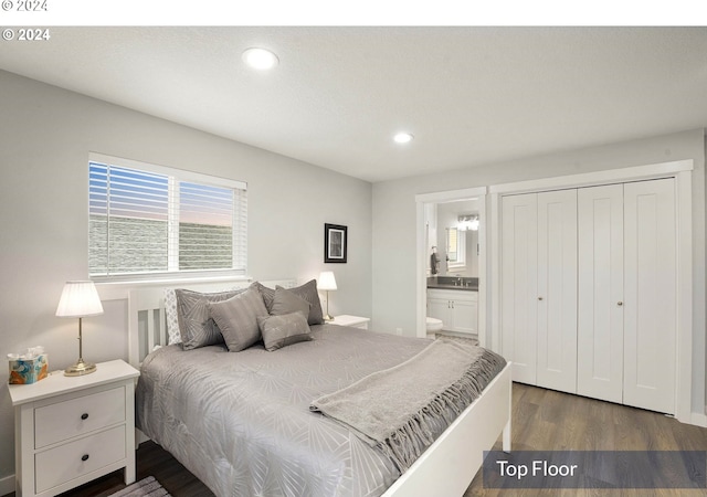 35165 Rueppell Ave, Pacific City, OR 97135 - bedroom featuring wood finished floors, recessed lighting, ensuite bath, a sink, and a closet