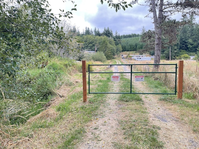 view of gate featuring a rural view