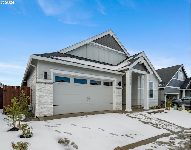 view of front of property with a garage