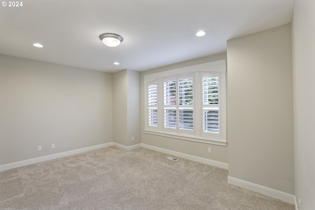 empty room with light carpet