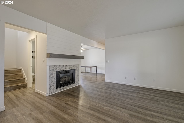 unfurnished living room featuring wood-type flooring