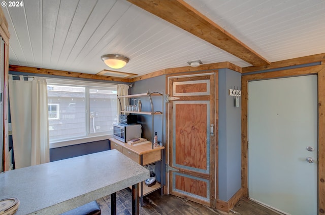 home office featuring dark hardwood / wood-style floors and wooden ceiling