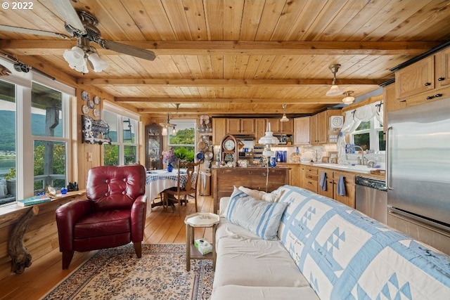 living room featuring wood ceiling, ceiling fan, sink, beam ceiling, and light hardwood / wood-style flooring