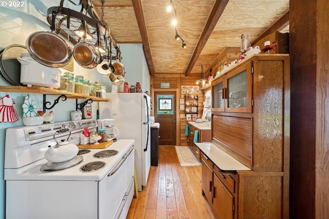 kitchen featuring white electric range, hanging light fixtures, wooden walls, light hardwood / wood-style floors, and wood ceiling