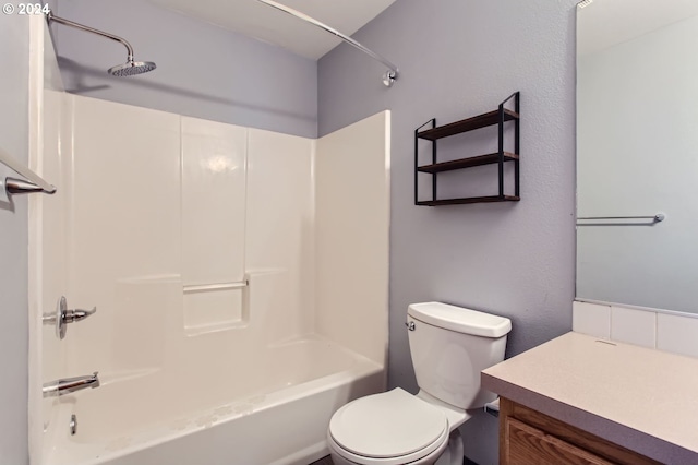 full bathroom with shower / bath combination, vanity, and toilet