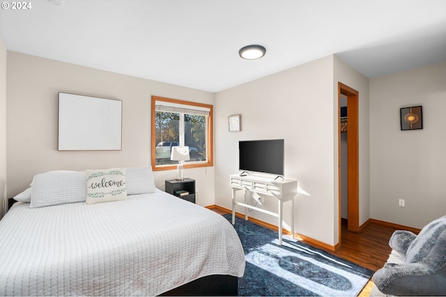 bedroom featuring wood-type flooring