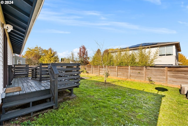 view of yard with a deck