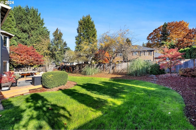 view of yard featuring a deck