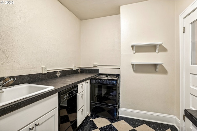 kitchen with black appliances, sink, and white cabinetry