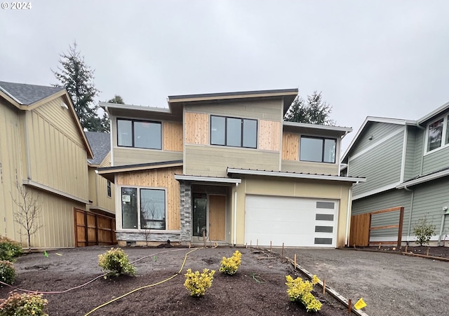 modern home featuring a garage